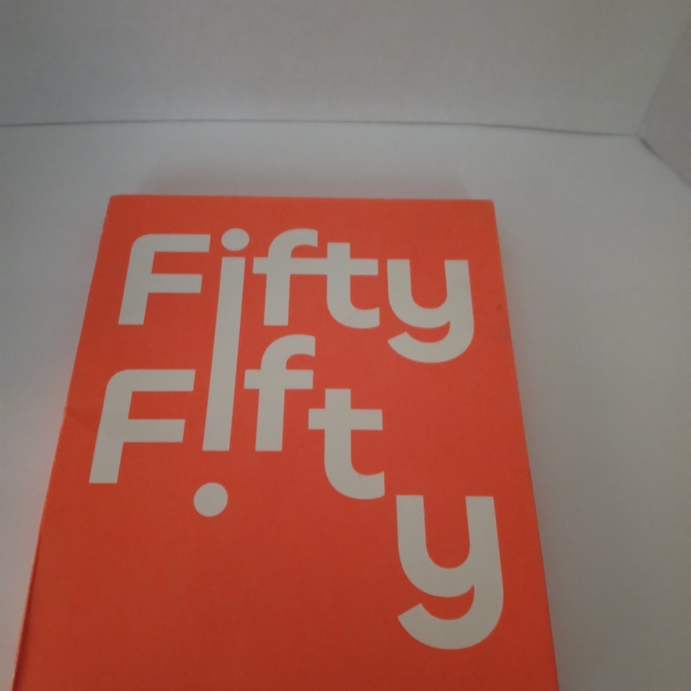 K-pop group FIFTY FIFTY's compilation album, The Beginning (Version 2 - Orange).